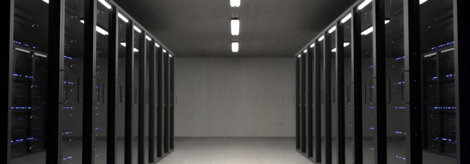 An image of a server room with multiple servers stacked up on racks, showcasing the concept of dedicated hosting