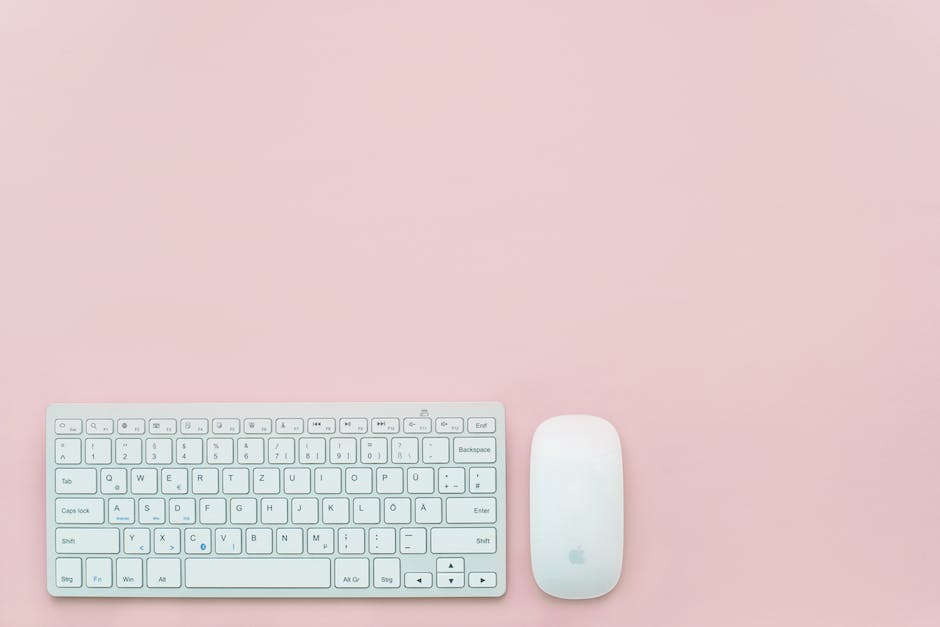 Image of a person typing a domain name on a keyboard