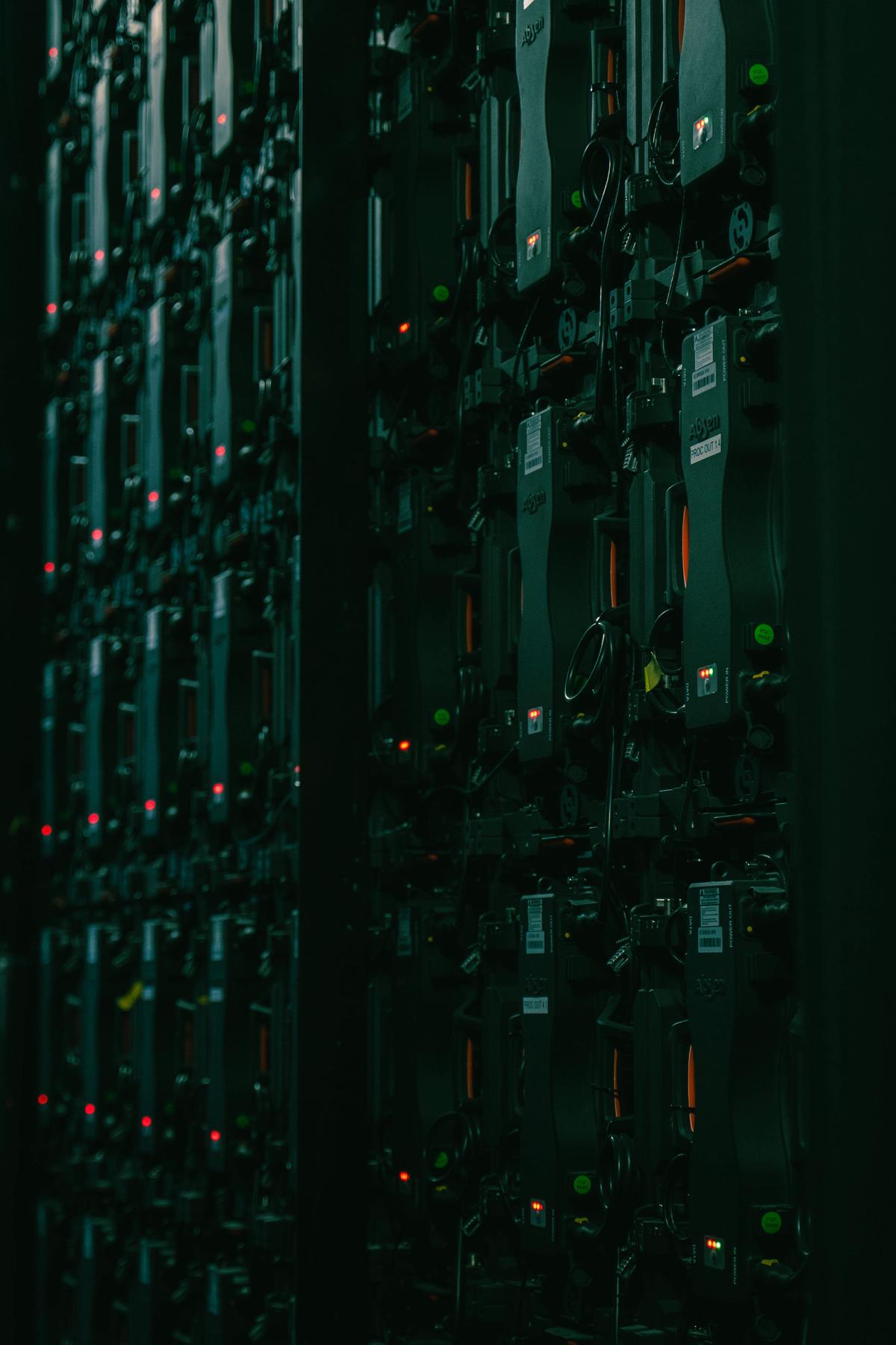 An image depicting a server room with multiple servers and network equipment.